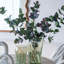 S / 2 vases décoratifs en verre vert avec motifs de visage