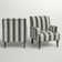 Arching Armchair With Solid Wood Turned Legs and Nailhead Trim
