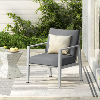 Aluminum Lounge Chair With Sleek Rope Accents And Comfortable Cushions, Perfect For Modern Outdoor And Indoor Spaces