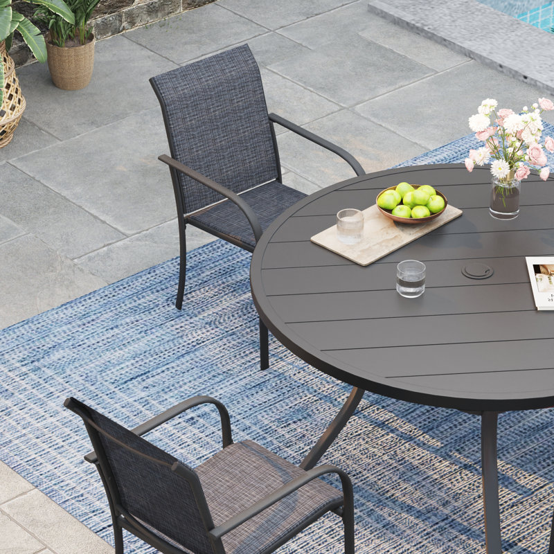 Ensemble de salle à manger de patio pour 4 personnes avec chaises empilables PVC-coated polyester, Noir / Noir