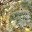 Sapin de Noël artificiel en polyéthylène pré-illuminé de 1,80 m avec branches semi-floquées à effet neige et support en métal