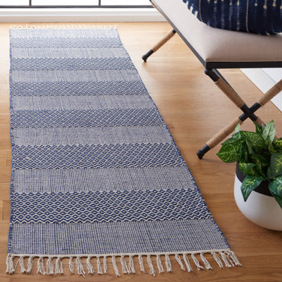 Tapis rayé ivoire / bleu marine en coton tissé à plat à la main Annia