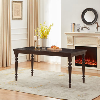 Anistyn 63" Solid Wood Dining Table