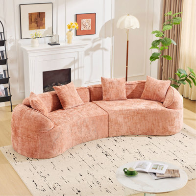 Curved Sofa With Four Pillows