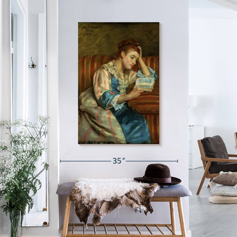 Duffee sur un canapé rayé, H 36 po x l 24 po