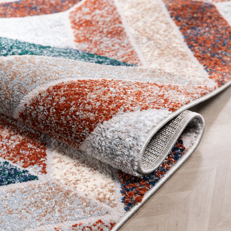 Geometric Blue and Orange Synthetic Area Rug, 5'3" x 7'3"