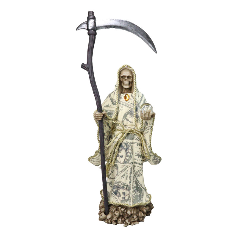 Statuette de la Sainte Mort avec faux et boule de cristal, vêtue d'une robe en billets de banque.