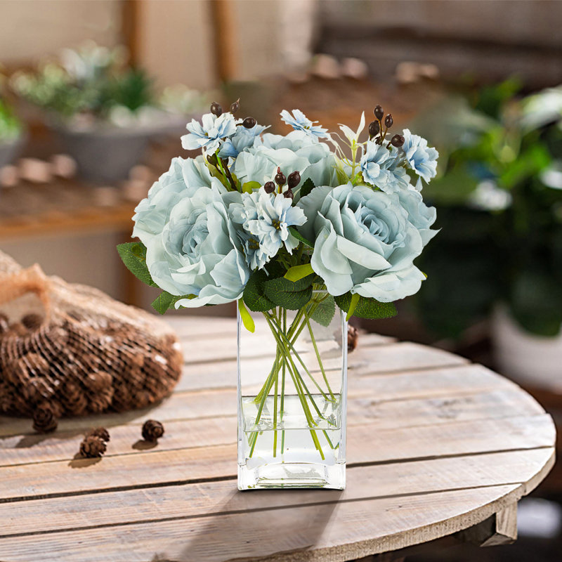Arrangement floral rose dans un vase, Bleu
