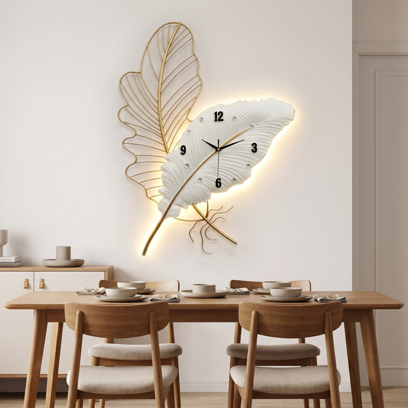 Horloge murale en plumes avec lumière DEL, horloge murale en métal de luxe moderne, sculpture murale silencieuse sans tic pour le salon, la chambre à coucher et le bureau