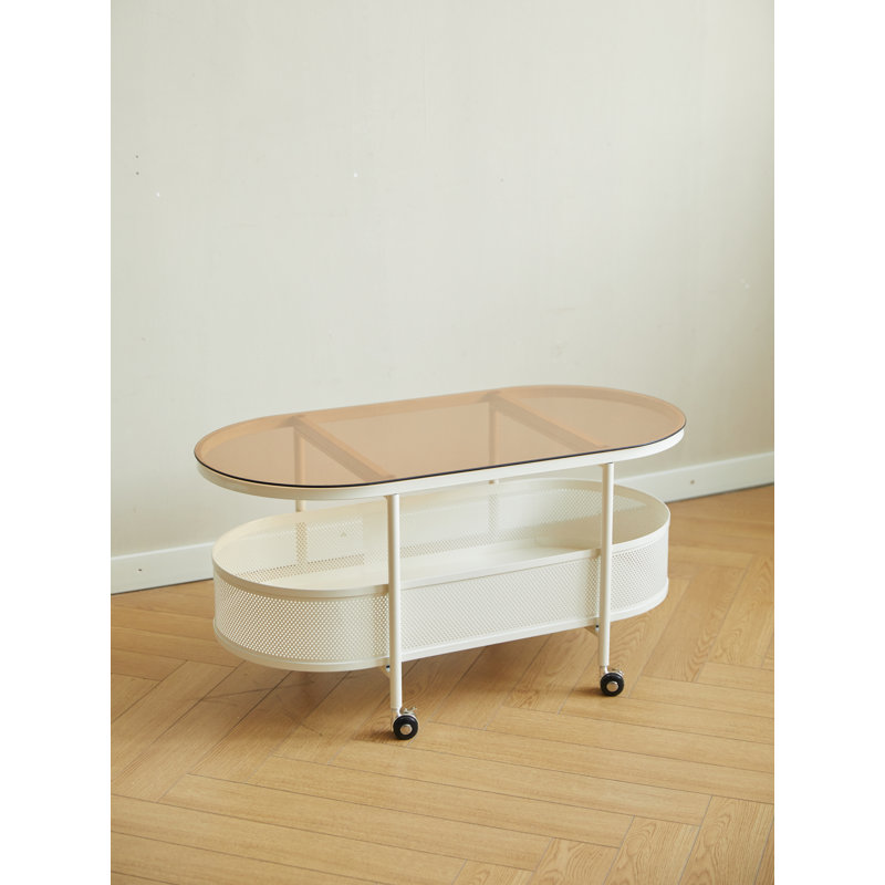 Table basse mobile ovale en verre et métal avec rangement