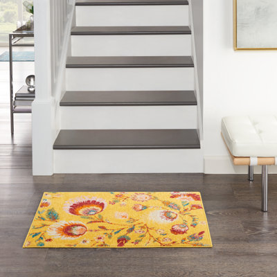 Tapis jaune à motif floral Lakenya