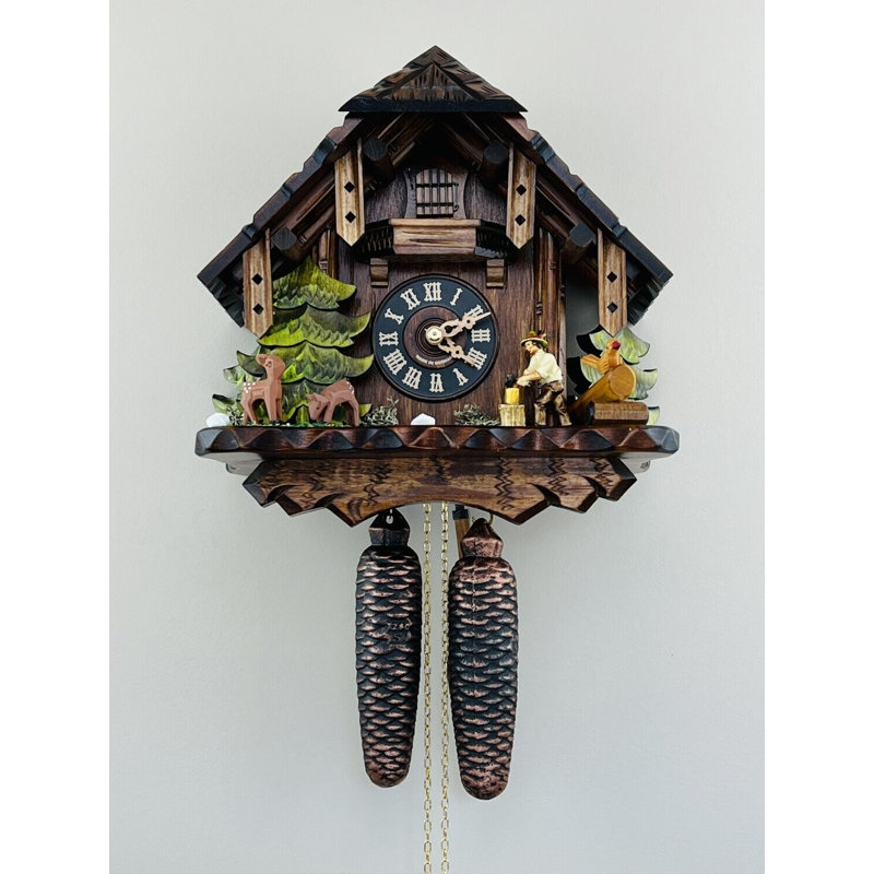  Horloge coucou en bois avec homme de 12 pouces coupant du bois
