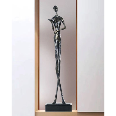 Figurine décorative moderne abstraite représentant une silhouette humaine debout, silhouette mince et artistique.