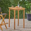 Table de bar d'extérieur carrée en bois d'acacia minimaliste avec une résistance aux intempéries et des pieds fuselés élégants