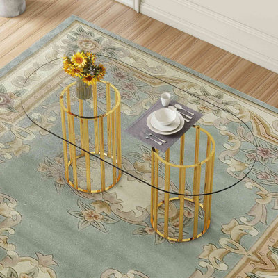 Table de salle à manger ovale en verre trempé, double colonne de style luxueux, verre trempé résistant aux égratignures et facile à nettoyer. Convient pour une salle à manger de luxe pour 6 à 8 personnes.