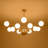 12 - Light Brass Frosted Glass Globe Starburst Chandelier