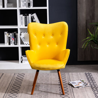 Superbe chaise contemporaine à dossier en velours jaune avec boutons et pieds en bois massif