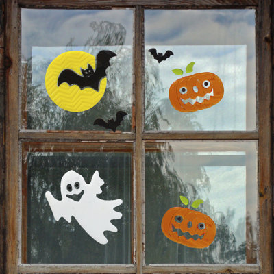 Fenêtre de gel fantôme et citrouille d'Halloween