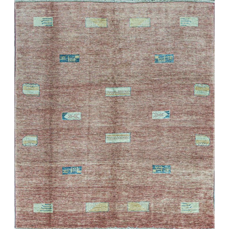 Tapis rose de haute qualité noué à la main