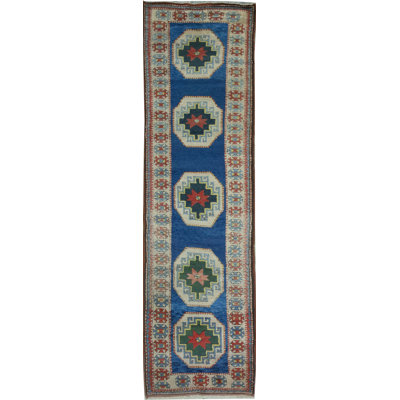Tapis bleu et ivoire de haute qualité noué à la main