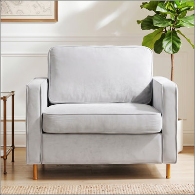Canapé une place en chenille douce avec coussin amovible et pieds en fer, idéal pour les intérieurs modernes et décontractés.