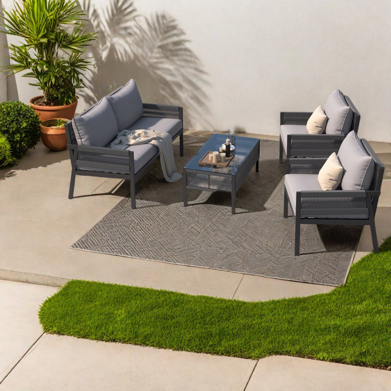 Ensemble de salle à manger de patio durable 4 pièces avec table en verre trempé, style boho pour le divertissement dans la cour
