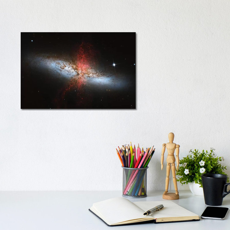 A Starburst Galaxy (M82) In The Ursa Major Constellation by Roberto Colombari - Wrapped Canvas Print, 20.32 cm H x 30.48 cm W