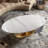 49.2" Oval Coffee Table with Faux Marble Top, Gold Stainless Steel Base with Abstract Fantastic Midsize Sphere Crescent-Shaped Design-1678648414