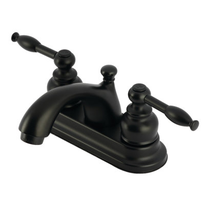 Robinet de salle de bain central à 4 poignées à 3 trous à fixation sur le comptoir en laiton Kingston