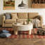 Table basse ronde avec plateau rabattable et compartiment de rangement caché