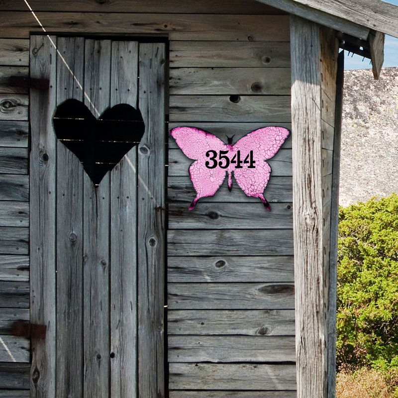 Fixation murale papillon