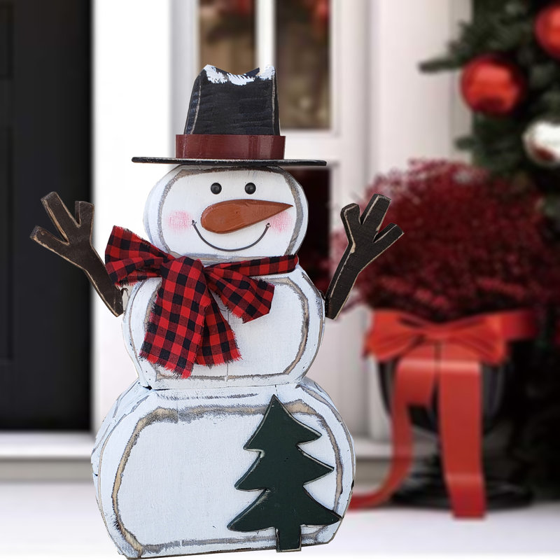Bonhomme de neige en bois avec écharpe