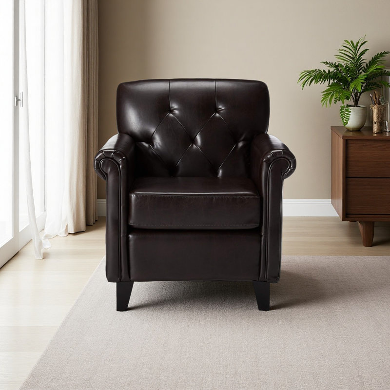 Fauteuil club capitonné