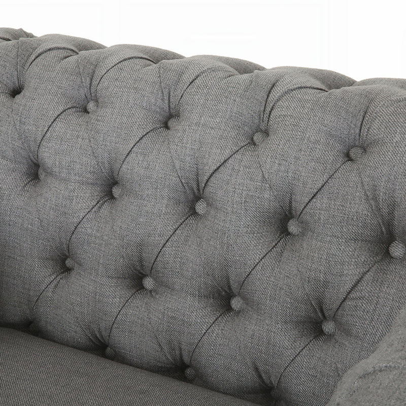Fauteuil club capitonné