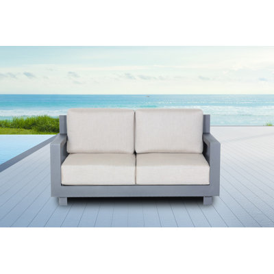 Causeuse de patio avec coussins Koeller