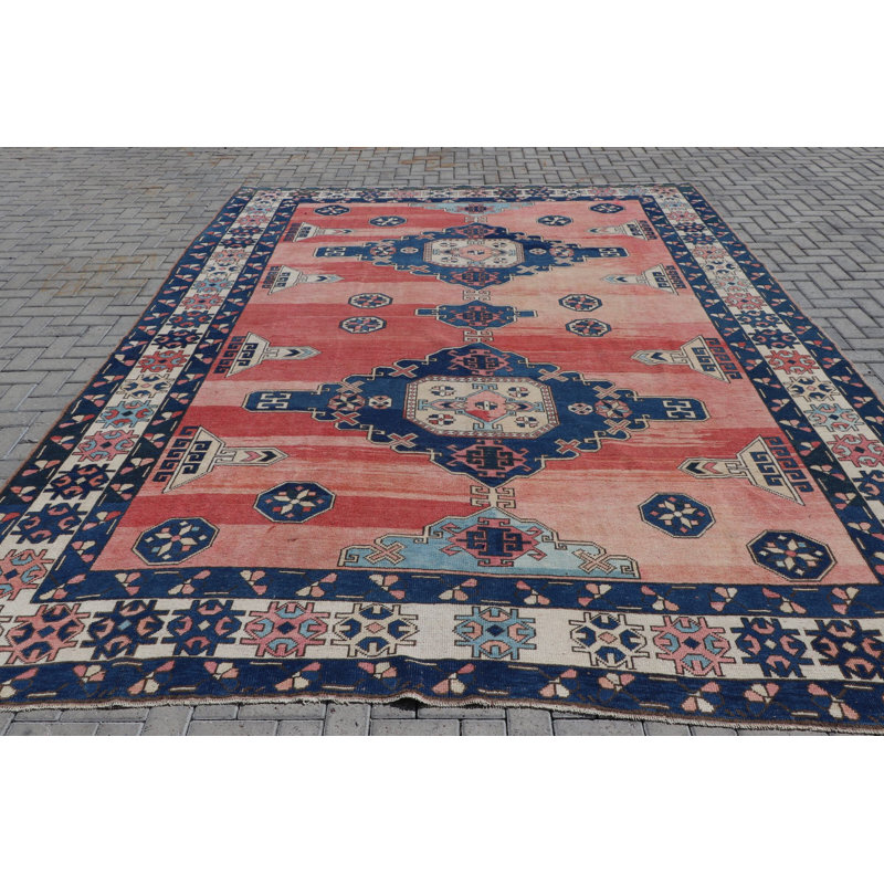 Tapis turc en laine fabriqué à la main avec un motif ethnique idéal pour les espaces surdimensionnés