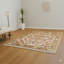 Tapis beige délicat noué à la main