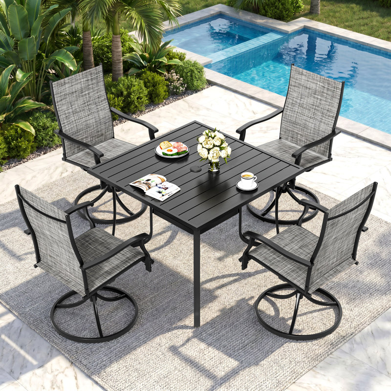 Ensemble de salle à manger de patio 5 pièces Wishon avec 4 chaises pivotantes Textilene
