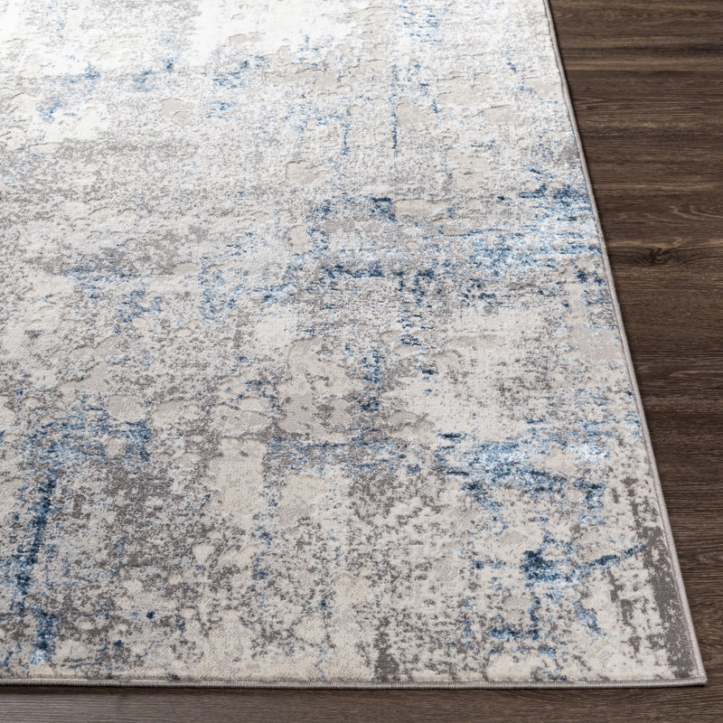 Tapis bleu foncé / beige tissé à la machine Addilyn, Rectangle 5 pi 2 po x 7 pi