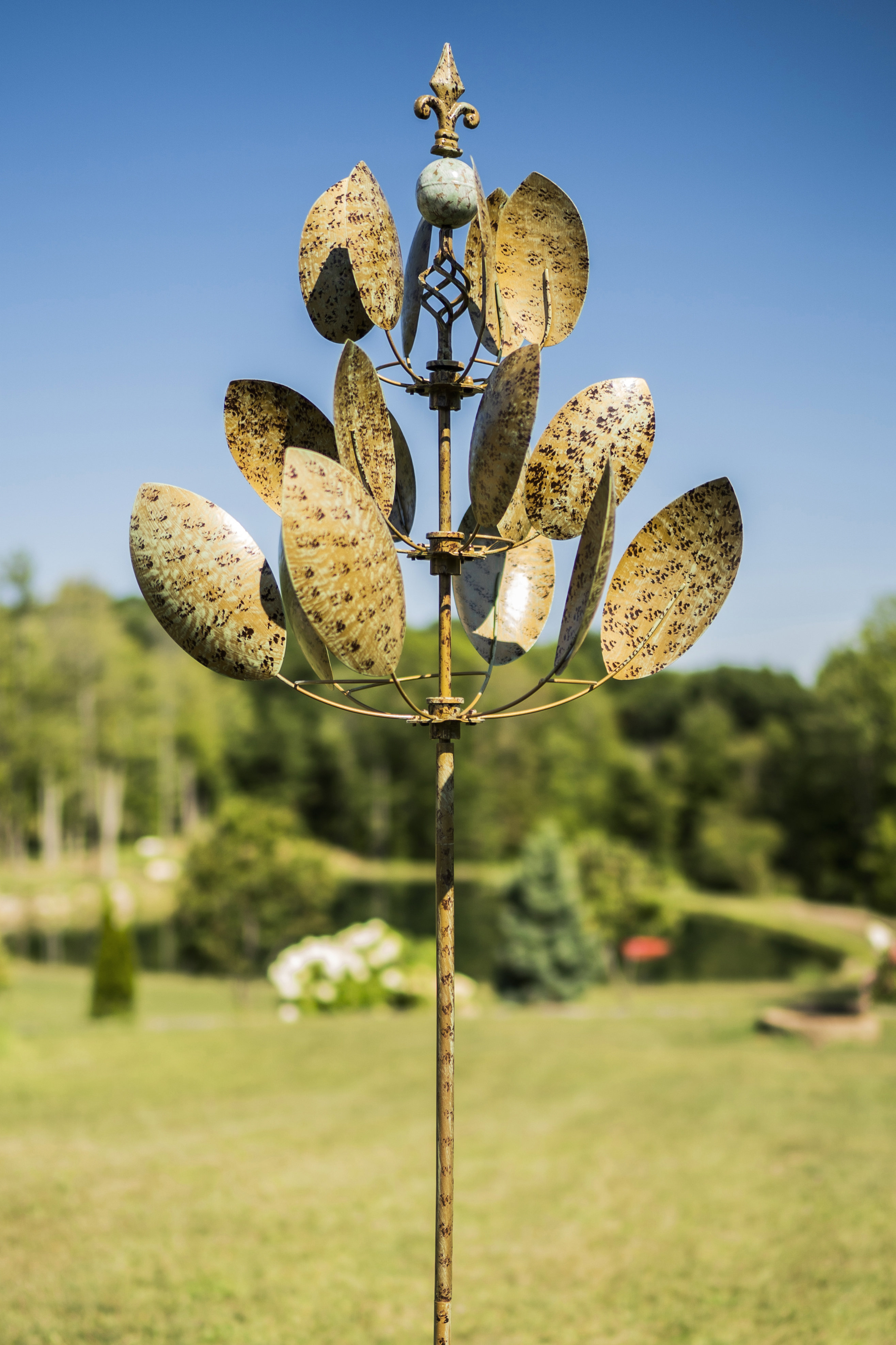 Ophelia & Co. Amot Weather Resistant Metal Abstract Rotator & Reviews