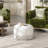 Labus 24" Round Upholstered Accent Ottoman