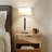 Carter 26 in. Mid-Century Modern Linen and Woodgrain LED Table Lamp