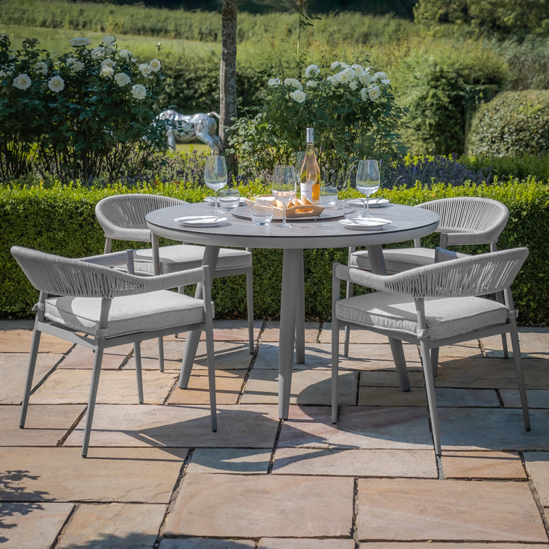 Anduin 4 - Person Patio Dining Set with Round Table