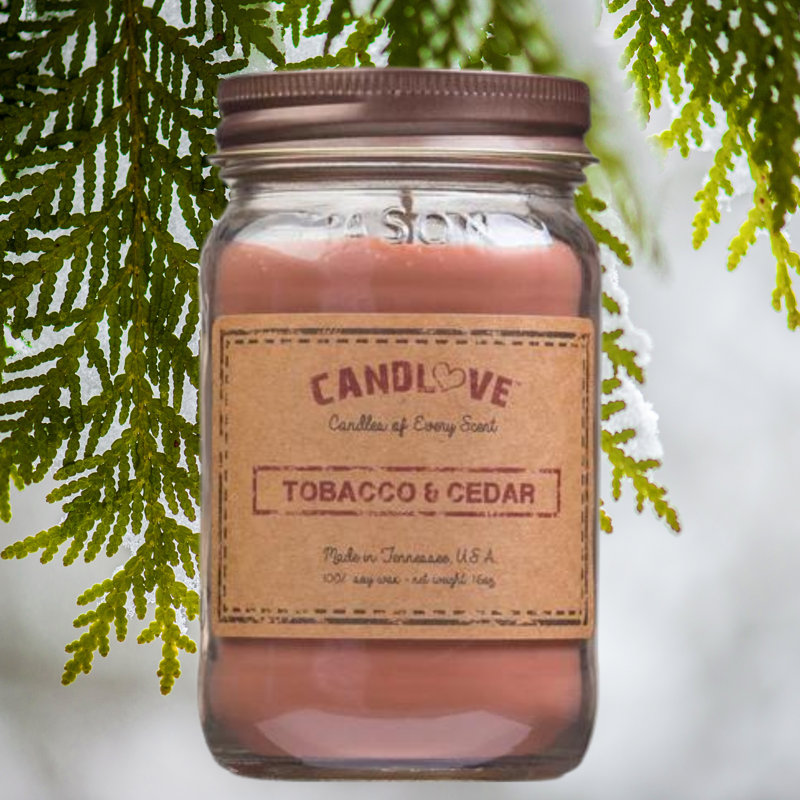 Bougie parfumée en pot cèdre tabac avec support en verre