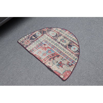 Paillasson demi-cercle avec motif floral bohémien dans des tons multicolores rouges et bleus