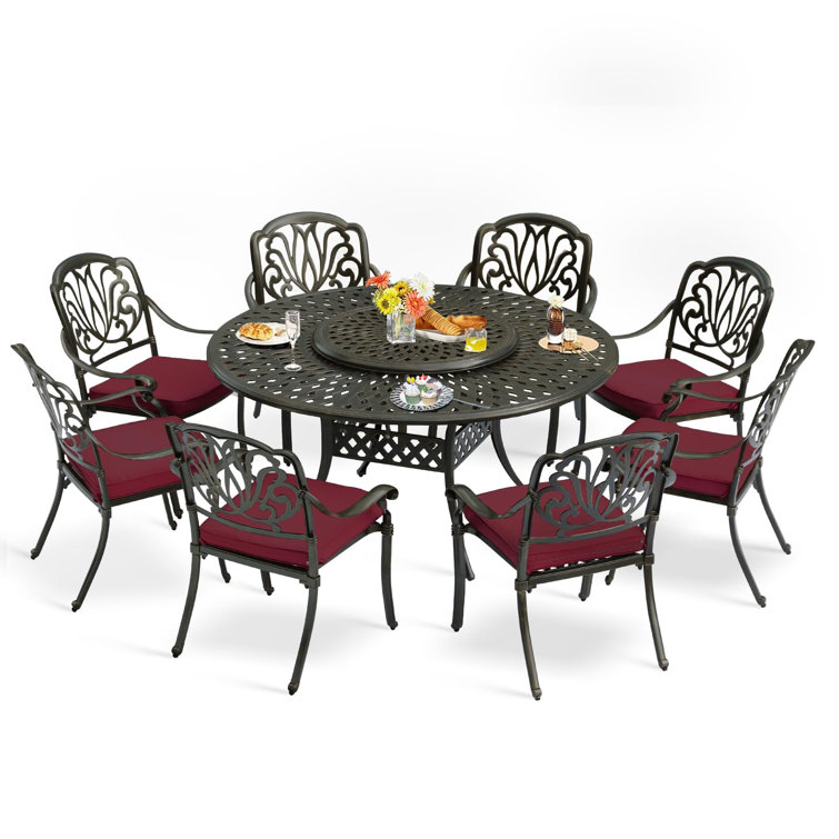 9-Piece Dining Set includes 1 round table with detachable lazy susan, 8 cushioned chairs