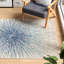 Tapis à motifs abstraits bleu royale et ivoire Faustina-1563713764