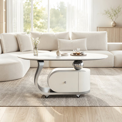 Table basse ovale moderne de 39,4 po avec rangement, plateau en pierre frittée et roulettes verrouillables