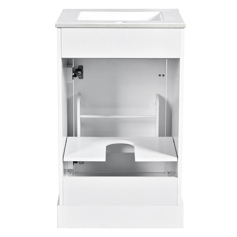 Meuble-lavabo de 20 po avec lavabo en céramique, porte à fermeture douce, tablette réglable et support de porte, blanc, finition moderne pour une salle de bain élégante, petit rangement