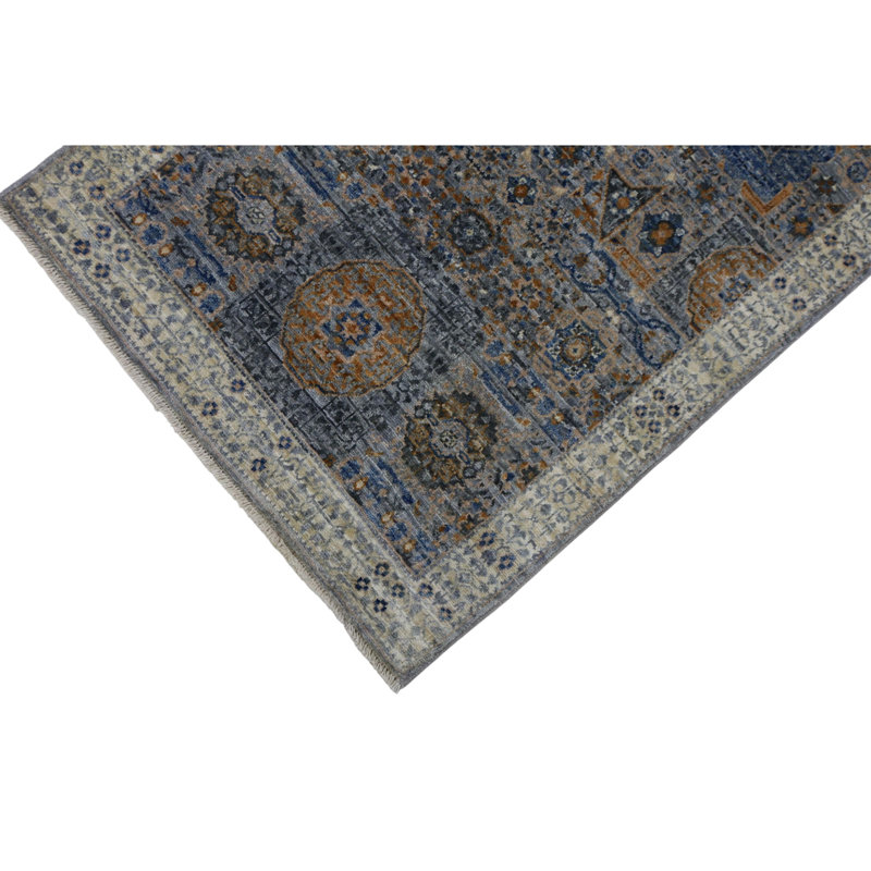 Hand Knotted Wool Area Rug in Silver And White